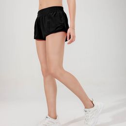 L-09 hotty Hot shorts Short taille basse Short de yoga respirant à séchage rapide Short de sport doublé intégré Fermeture éclair cachée Poches latérales encastrées Pantalon de survêtement de course avec