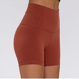 L-163 Mujeres Pantalones cortos de yoga de cintura alta Mujeres desnudas Deportes Bolsillos apretados Apretar la cadera Verano Correr Fiess Pantalones transpirables Levantamiento de glúteos Leggings