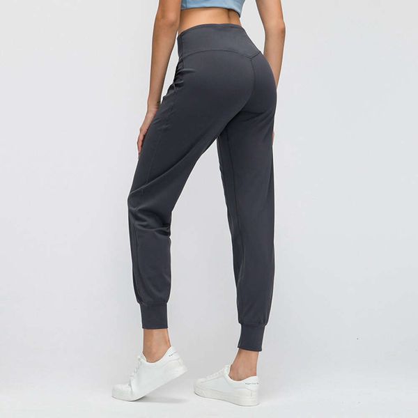 L-88 pantalones de Yoga Leggings para mujer ejercicio físico desnudo bolsillo lateral melocotón medias de cadera Joggers Sexy negro y colores calzoncillos