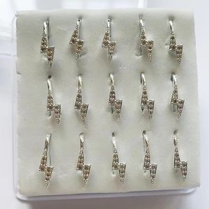 Labret Lip Piercing Bijoux 15pcs Minuscule zircon Lightning faux anneaux de nez Plaqué or 18 carats sur cuivre Dainty piercing Femmes bijoux de corps En gros 230906