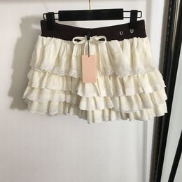 Faldas de diseño de encaje vestidos de cintura alta letras de moda vestido bordado faldas de pastel de beige chicas de lujo