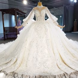 Dentelle broderie cristaux luxueux robe de bal robes de mariée manches longues col haut gonflé princesse église robes de mariée Arabie Saoudite Dubaï Robes De Novia s