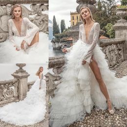 Lace Lace Longes manches incroyables Robes de mariée Deep V Neck Neckles Backles Bridal Bridal A Line Tiered Side Split Tulle Robe de Mariee