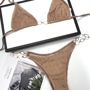 Ropa interior textil sexy de malla de encaje para mujer Bikini con cadena de letras huecas Bikini para vacaciones en la playa Bikinis para tomar el sol Vendaje sin espalda Sólido Col273B
