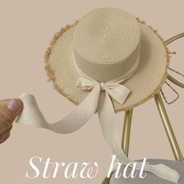 Cappello da donna in paglia da spiaggia, cappelli estivi con fiocco grande, cappello a tesa larga in tessuto, protezione solare per le vacanze, cappello da sole all'ingrosso