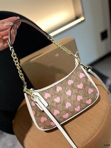 Sacs de créateurs sacs de sacs de chaîne d'épaule de haute qualité c portefeuille portefeuille accessoires de quincaillerie à bourse réel en cuir rose motif de coeur rose femme sac à main de luxe sacs