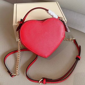 Mesdames Fashion Love Sac de créateur Sac de luxe Sac époux sac fourre-tout Chaîne de coeur Sac en forme de coeur en cuir Sac à corps crossbody Sac