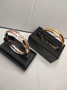 dames gouden kettingarmband voor vrouwelijke ontwerper gouden hoek twee kleuren overlappen designer sieraden femme zilveren set diamant eenvoudige horloges mannen echtpaar armbanden Jewlery