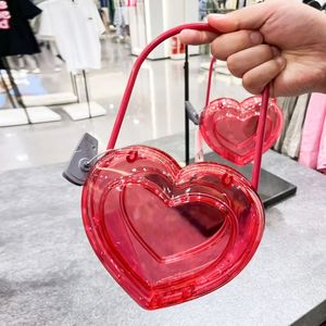 Sacs de soirée en forme de coeur pêche aux dames pour femmes sacs à main de concepteur de luxe dans ABS en plastique transparent Box épaule 240430