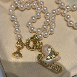 Lady Designer colgantes colgantes de Saturno Pon de corazón Collar Pearl Collar de oro Plata pesada