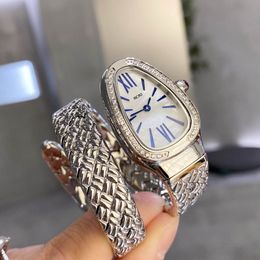 Lady Quartz Watch Snake Shape Unieke kunststijlontwerp interieur gemaakt van geheugenveermateriaal Sieraden Zirkon Diamond set met diamanten ambacht 23x34mm afmetingen