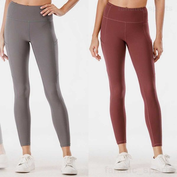 Lady Yoga Sport Legging Naked High Rise Tight Pants Bolsillos elásticos Bodybuilding Sweatpant Seamless Scrunch Ejercicio Pantalón Running Long Pant