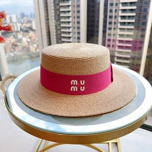 Lafite Grass Weaving Designer Bucket Hat Lente/Zomer Trendy met decoratieve letter Logo Platte bovenkant Kleine hoge hoeden Modieuze strandhoed