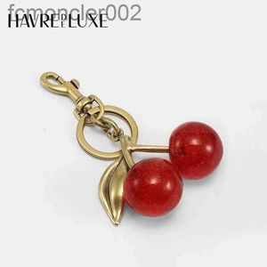 Lanyards 2024 sleutelhangers Tasaccessoires Charm Handtas Hanger Coach Handtassen Sleutelhanger Dames Exquisite Internetfamous Crystal Cherry c 1E1Y