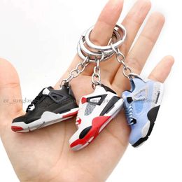 Lanyards 34 estilos diseñador mini 3d zapatillas de baloncesto llaves de zapatillas estereoscópicas de la cadena de llaves mochila colgantes 393