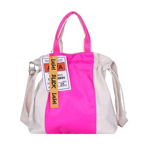 Grote capaciteit handtassen fluorescentie kleur patchwork canvas schoudertassen geschikt voor het winkelen causale bakken