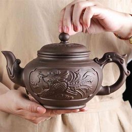 Grote capaciteit paarse zand theepot huishoudelijke kung fu cup yixing zhu ni pruim bloesem pot thee keramische ketel 210813