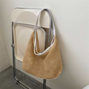 Grote capaciteit geweven tas casual draagtas zomer nieuwe veelzijdige gepersonaliseerde stro geweven onderarmtas