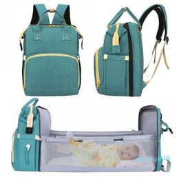 Grandes bolsas de pañales de maternidad de momia con cama plegable para un bebé Viajar en la mochila al aire libre para mamá cambiando el bolso de cochecito de pañales205O