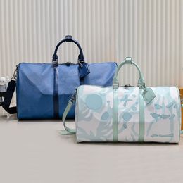 Grand sac fourre-tout Designer sac de voyage surdimensionné hommes sacs fourre-tout femmes sac polochon sacs de bagages décontractés sac de sport gouttelette d'eau sac à main bleu sac de luxe cadenas pochette pour clé