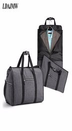 Largecapacité pliant la combinaison imperméable sac de voyage sac multifonction vêtements de sac à main sac de rangement de voyage Men039