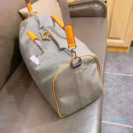 Láser Hand Luggage Bag Travel Bag Imploud Duffel Men Bag Bold Bold Boys Style Unisex Women Package de alta calidad mochilas de lona 2275