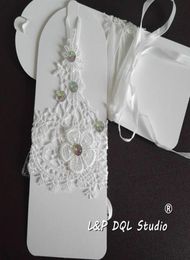 Últimos guantes de novia de encaje corto con cuentas recién llegados accesorios de boda guantes de novia baratos Ivory6904404