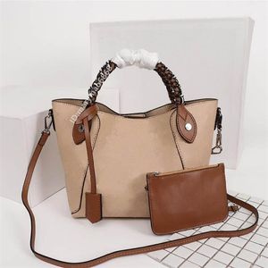 Laatste vrouwen handtas merk mode luxe holle gesneden designer crossbody tas hoge kwaliteit draagbare + schouder vrouw tas maat 23x21x13cm