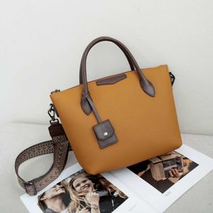 Layer Top Cowhide enkele schouder dames tas grote capaciteit Crossbody tote modieuze en minimalistische winkelkleurcontrast niche