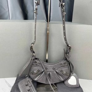 Le Cagole série sac boulette demi-lune clou de saule moto cuir grain fin motif crocodile avec épaule miroir de maquillage en forme de cœur Cross Body