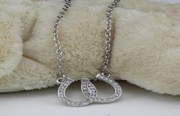 Lood- en nikkel sieraden dubbele paardenschoen hanger ketting paardensport hoefijzers sieraden versierd met wit Tsjechisch kristal3640594
