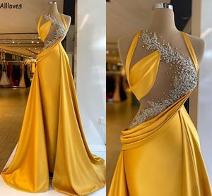 Bladverfraaiing pailletten Arabisch aso ebi avondjurken gele halter sexy hol uit lange zeemeermin prom feestjurken voor vrouwen overskirts satijn formele slijtage cl2264