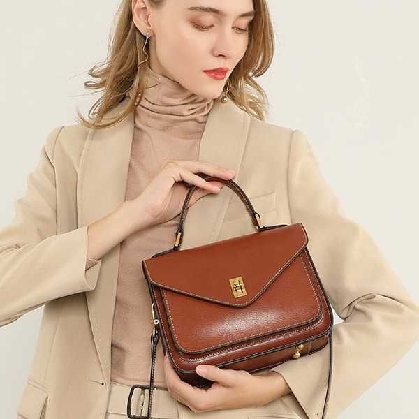 Sac en cuir Velle de vache tannée à haute qualité Temperament de mode simple Tempérament pour femmes Hand Tensient une épaule Menger