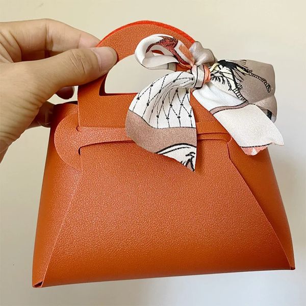 Sac cadeau en cuir pour faveurs de mariage boîte à bonbons noeud papillon personnalisé Eid Mubarak sacs d'emballage de bijoux portables en gros 240113