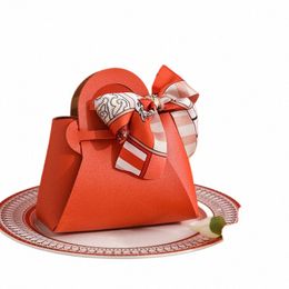 Sacs-cadeaux en cuir Sac d'emballage de ruban d'arc Mariage Favoule Distributis Sacs Eid Mubarak Candy Packaging Box Mini sac à main Z1KM # #