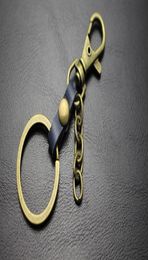 Cadena de llave de cuero Llave de la llave de la cadena de hebillas encanto más opción unisex bronce entero 9313080