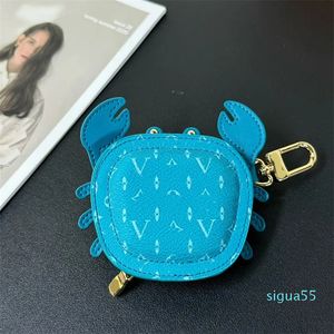 Keychains en cuir TRENDY 6 couleurs crabe pendentif porte-clés peut mettre le changement de widget de manège MINI MAIS MODCES POURNALES COINSE