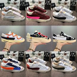 Chaussures de course basses en cuir chaussures de créateurs classiques baskets d'épissage en daim pour femmes nouvelles chaussures de skate haut de gamme pour hommes chaussures de sport graffiti à la mode chaussures plates antidérapantes à lacets