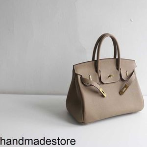 Lederen platina Tote Tas Classic Lock Buckle Casual 30 cm Cowhide Togo Leather Portable dameszak met logo