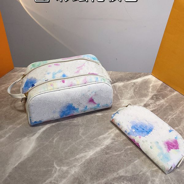 Cas de concepteur de voyages en cuir Cas cosmétiques Femmes Luxurys Designers Makeup Sac Petits sacs d'embrayage maquilleurs Pagnières à bagages