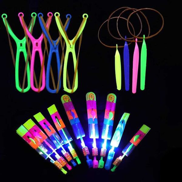 LED Flying Toys 5pcs Amazing Light Toy Toy Arrow Rocket Helicopter Flying Flying LED Light Toys Glow in the Dark Party Fun Gift Gift Band Catapult 240410