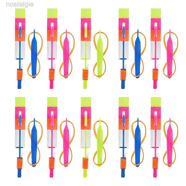 LED Flying Toys 6pcs Outdoor Shining Rocket Flash Light Light Night Kids Luminous Luming Slingshot Toys Shine Slingshot Elastic Helicopter Rotating Toy 240410