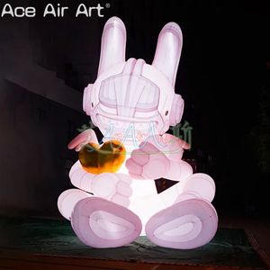 Iluminación LED Conejito rosa Decoración inflable Conejo malvado con figura de corazón dorado y alas para el Día de San Valentín