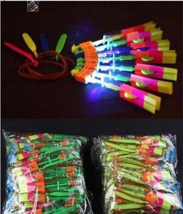 Luces LED juguetes Increíble LED Flying Arrow Helicóptero paraguas Eslingas para niños cumpleaños Regalo de Navidad suministros para fiestas 300pcslot 1177178