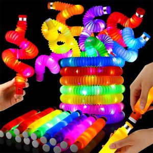 LED SwordsGuns 12Pack Light Up Pop Tube Fidget Tube Sensorisch speelgoed LED Light Up Fidget Glow Sticks voor kinderen Feestartikelen Glow In The Dark speelgoed 230809