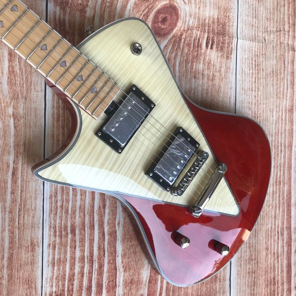 Gaucher Music Man Ernie Ball Armada Guitare électrique rouge naturel en forme de V avec dessus en érable flammé assorti, ventre coupé, contour du corps, accordeurs de verrouillage, matériel chromé