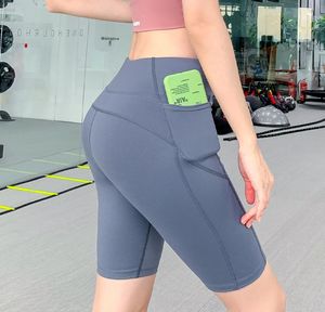 Legging Shorts de sport européens et américains pour femmes mince taille haute entraînement cinquième pantalon nouveau maigre hanche levée course Yoga à séchage rapide P3271679