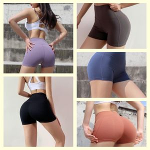 Leggings Pantalones cortos de yoga de fitness cómodos para mujer clásicos, deportes de verano de cintura alta, pantalones cortos de fitness elásticos.