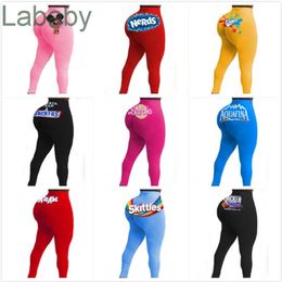 Leggings voor vrouwen ontwerper slanke letters patroon gedrukt snoep kleur potlood broek sexy yoga outfits dames mode strakke broek