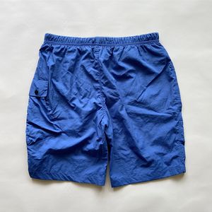 Pantalones cortos con bolsillo con cremallera para lentes Topstoney Pantalones cortos de nailon de fondo plano teñidos para nadar Pantalones cortos deportivos de nailon para exteriores talla M-XXL Pantalones cortos de calle para parejas de alta calidad